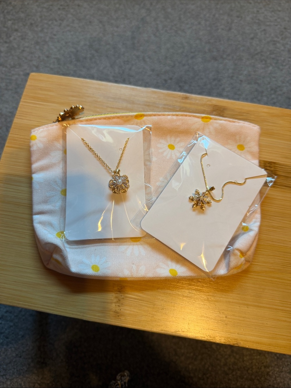 Pink Daisy Cosmetic Pouch with Gold Flower Necklaces